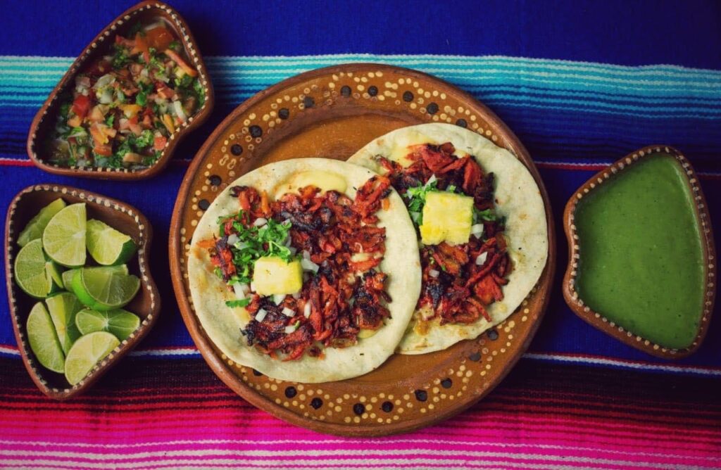 El Delicioso legado de los Tacos al Pastor: Una historia de sabores y tradiciones